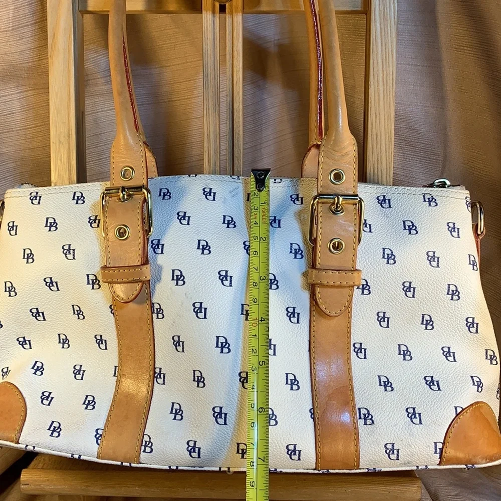 Dooney & Bourke leather satchel w/logo pattern